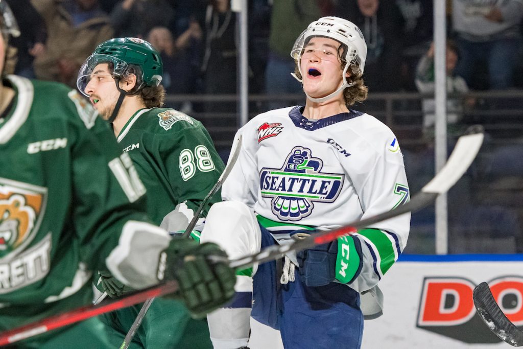 Jordan Gustafson of the Seattle Thunderbirds celebrates a goal against the Everett Silvertips.