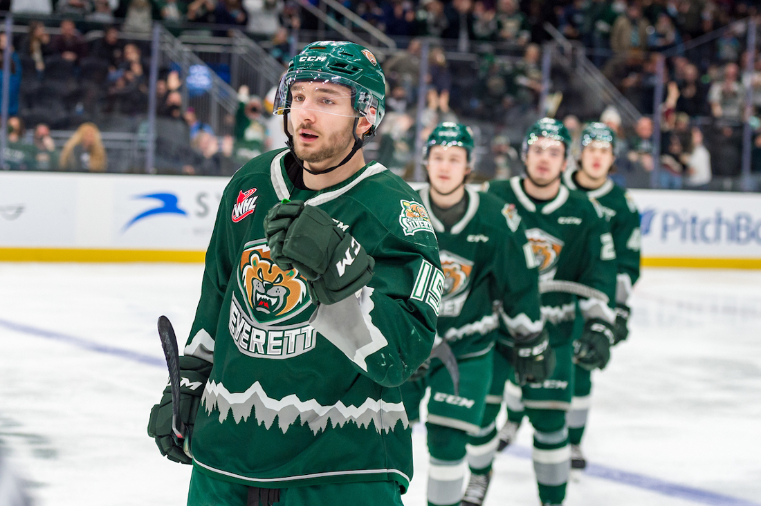 Ryan Hofer of the Everett Silvertips leads the way after scoring a goal