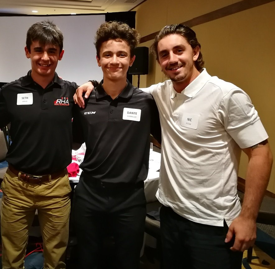 Seth Jarvis, Dante Giannuzzi, and Nic Petan pose for a photo at Portland Winterhawks camp in 2017