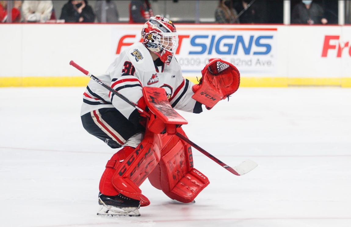 Dante Giannuzzi, goaltender for the Portland Winterhawks gets ready to stop a puck
