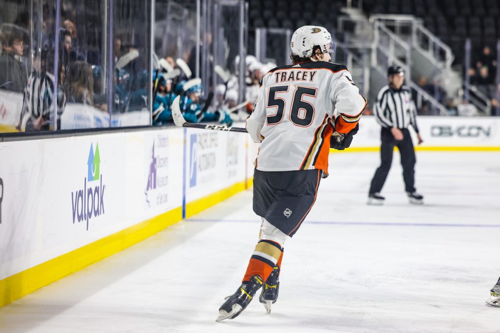 Brayden Tracey of the Anaheim Ducks skates away from the camera