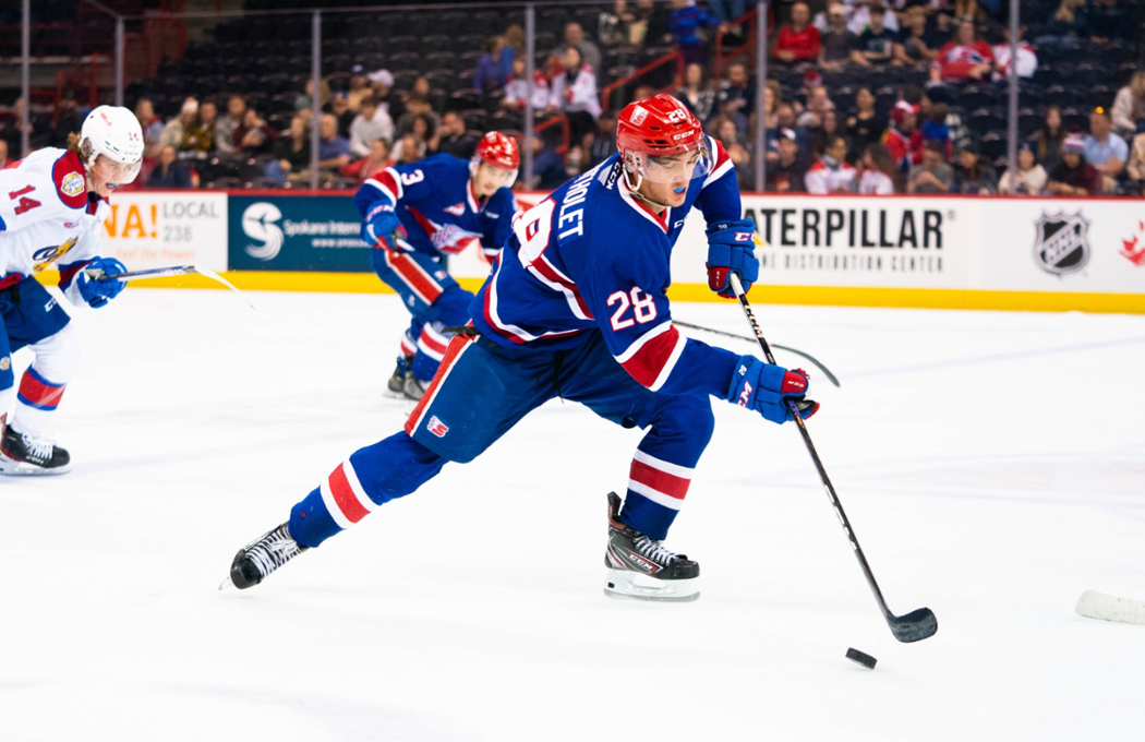 Spokane Chiefs forward Chase Bertholet skates with the puck