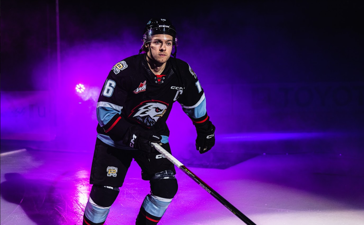 Portland Winterhawks captain Gabe Klassen skates onto the ice before a game