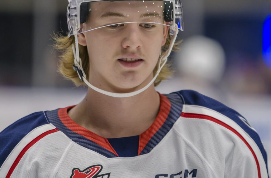A profile shot of Tri-City Americans forward Deagan McMillan in the Americans' white jersey